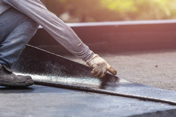 Professional Basement Waterproofing technician working in Centreville, VA